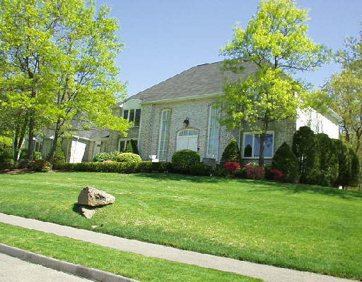 13 Kings Road Sharon, MA 02067 - Photo 1 of 1 a front view of a house with garden