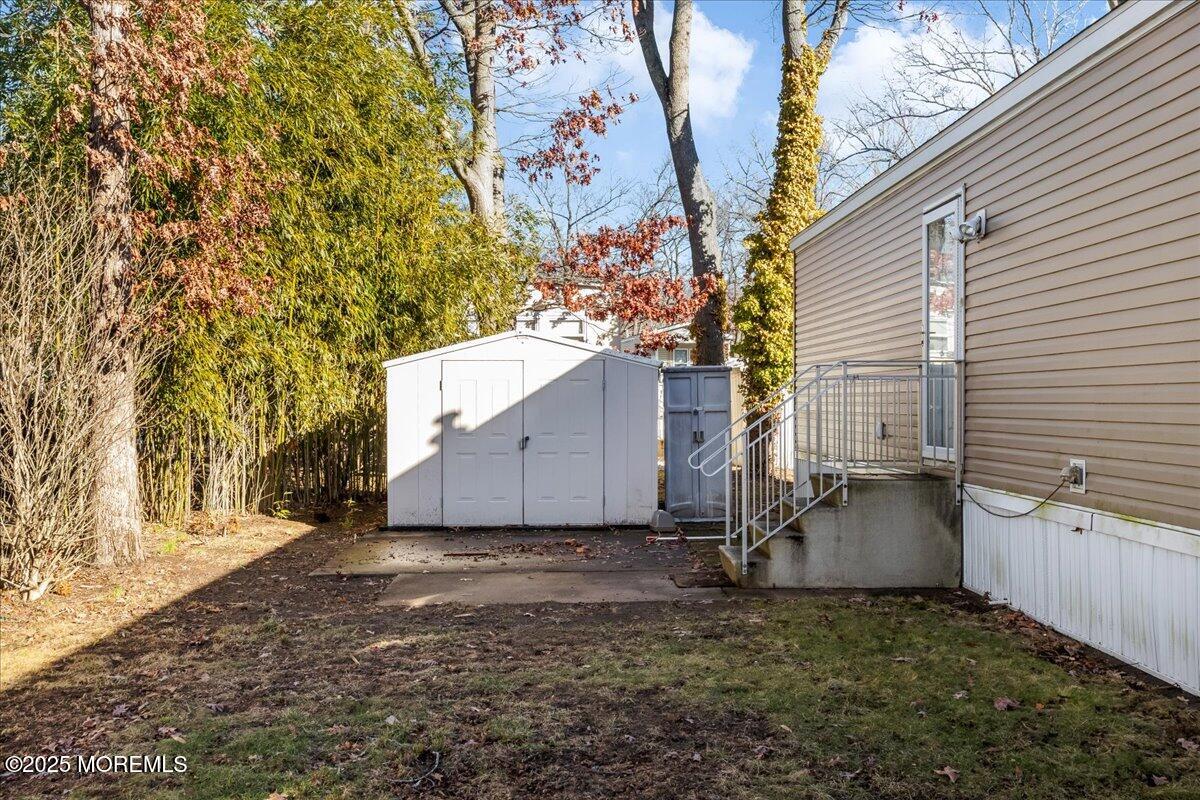 71 Roberts Road Toms River, NJ 08755 - Photo 4 of 14 a view of a backyard