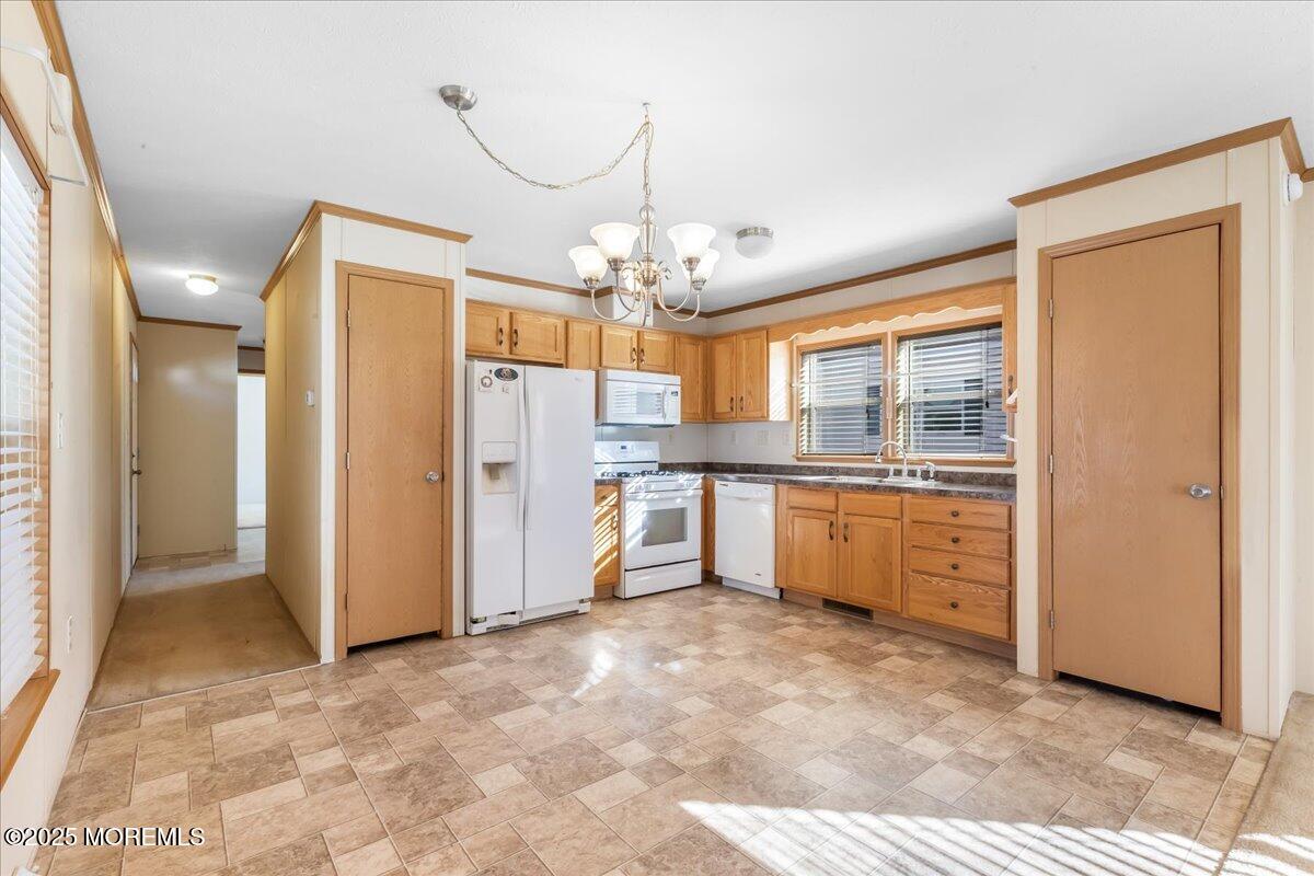 71 Roberts Road Toms River, NJ 08755 - Photo 7 of 14 a large kitchen with granite countertop a refrigerator and a sink