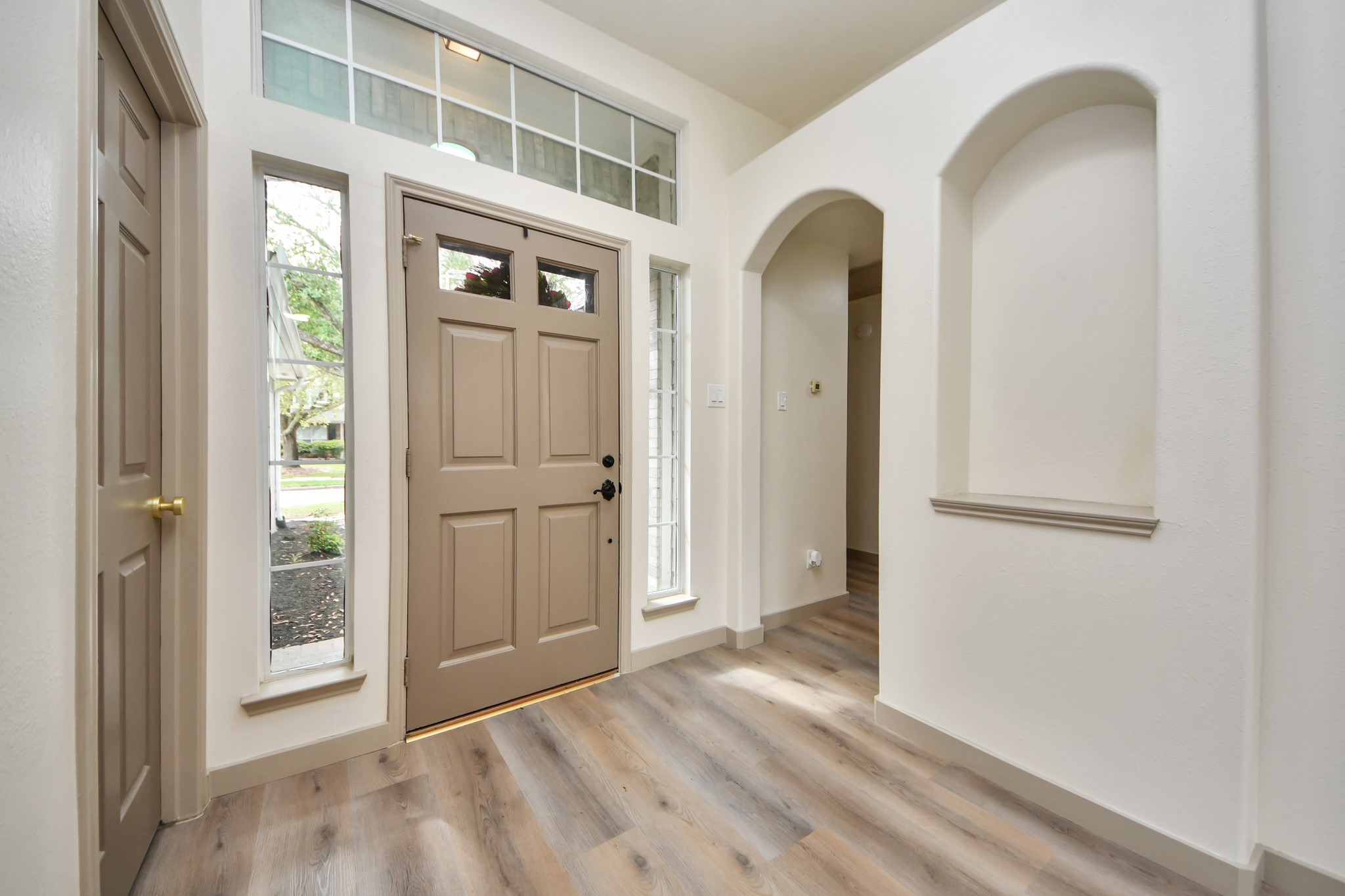14423 Gadwall Court Houston, TX 77044 - Photo 10 of 42 a view of a room with front door