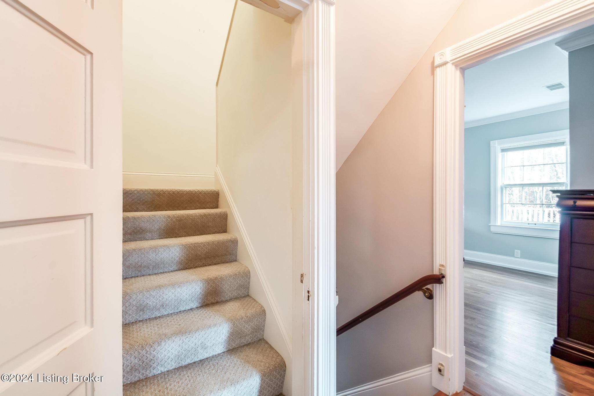 1731 Sulgrave Road Louisville, KY 40205 - Photo 56 of 86 2nd floor hallway looking up to 3rd floor and stairs down to 2nd floor