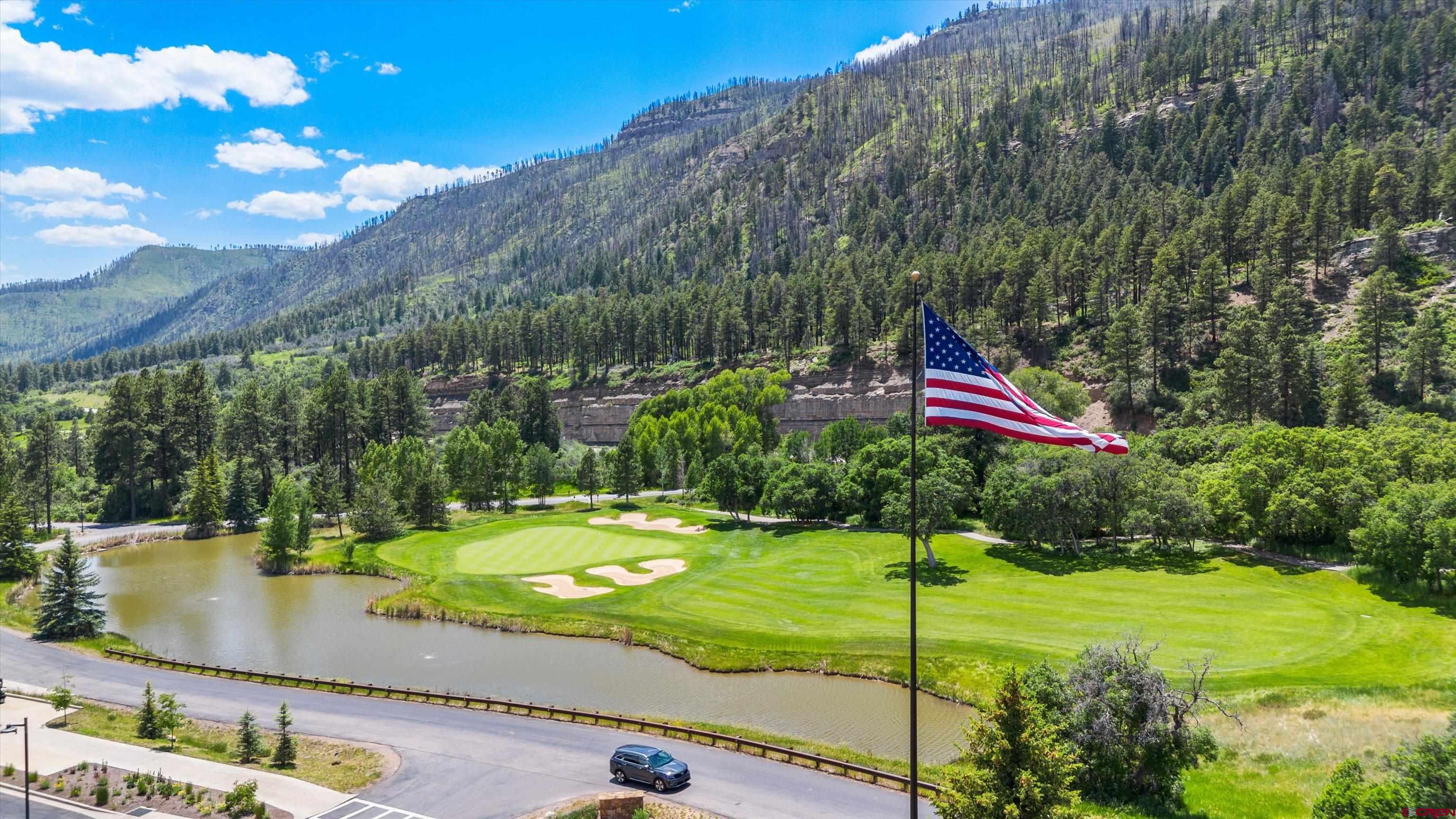 314 Tamarron Drive, Unit 511 Durango, CO 81301 - Photo 23 of 36 a view of a park with large trees