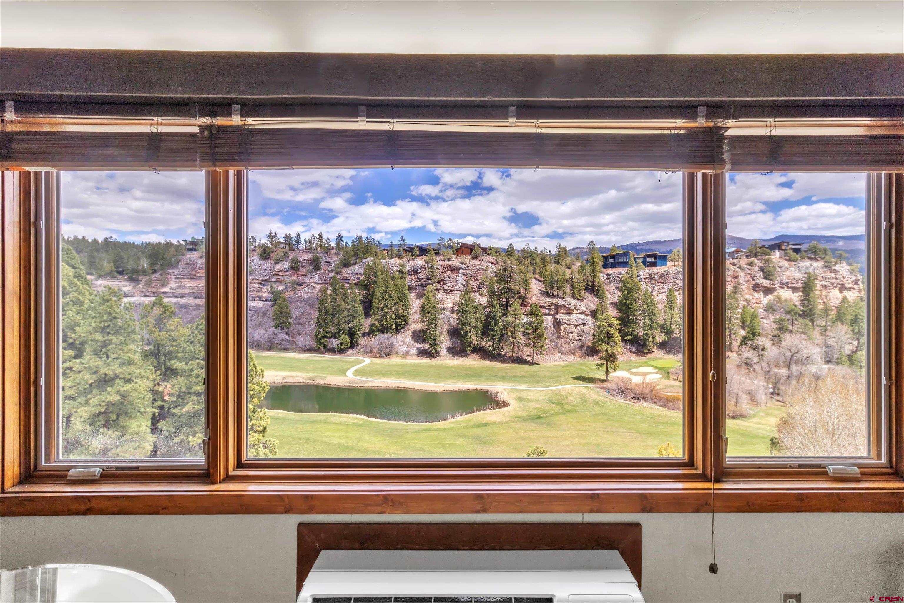 314 Tamarron Drive, Unit 511 Durango, CO 81301 - Photo 9 of 36 a view of a room that has a large window