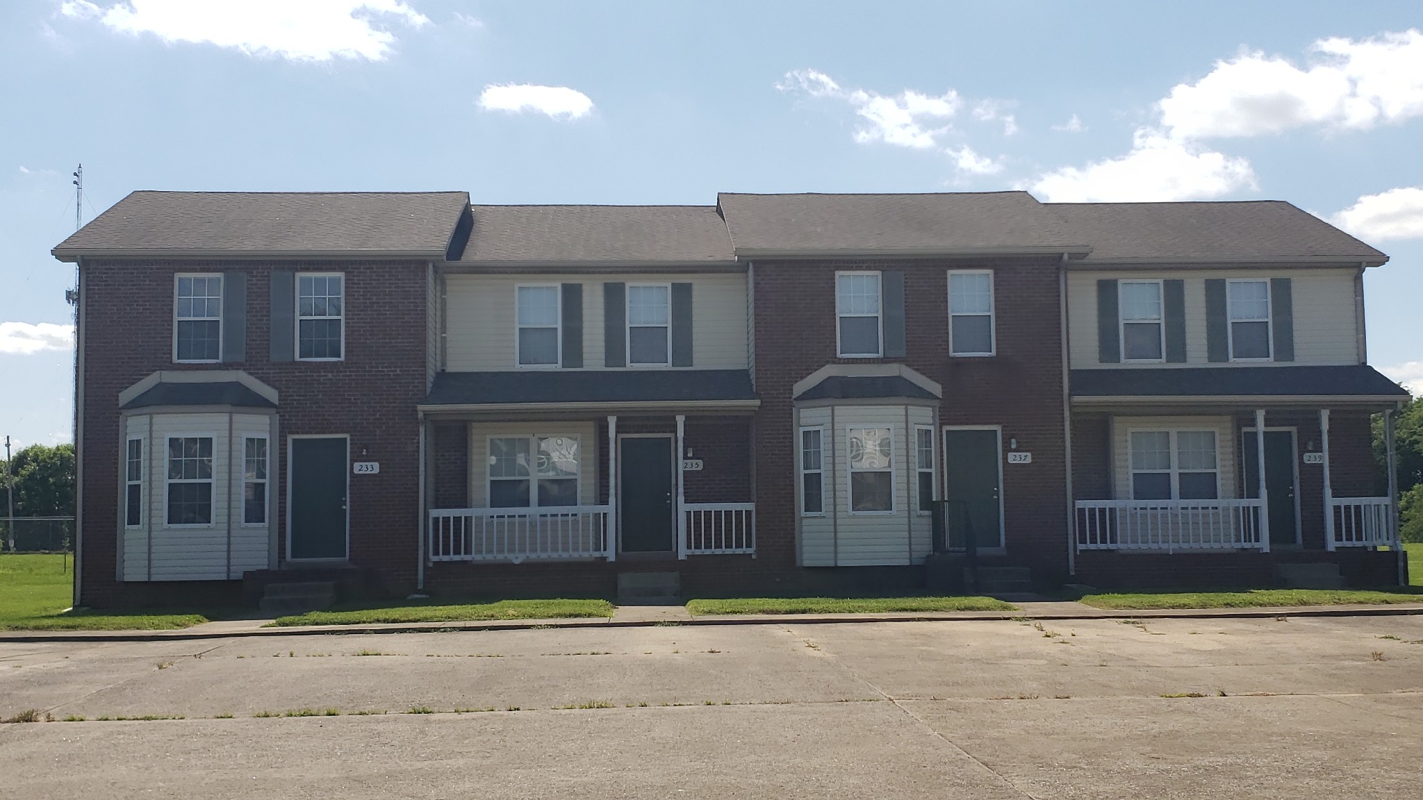 233 Tree Line Drive Oak Grove, KY 42262 - Photo 1 of 12 a front view of a residential apartment building with a yard