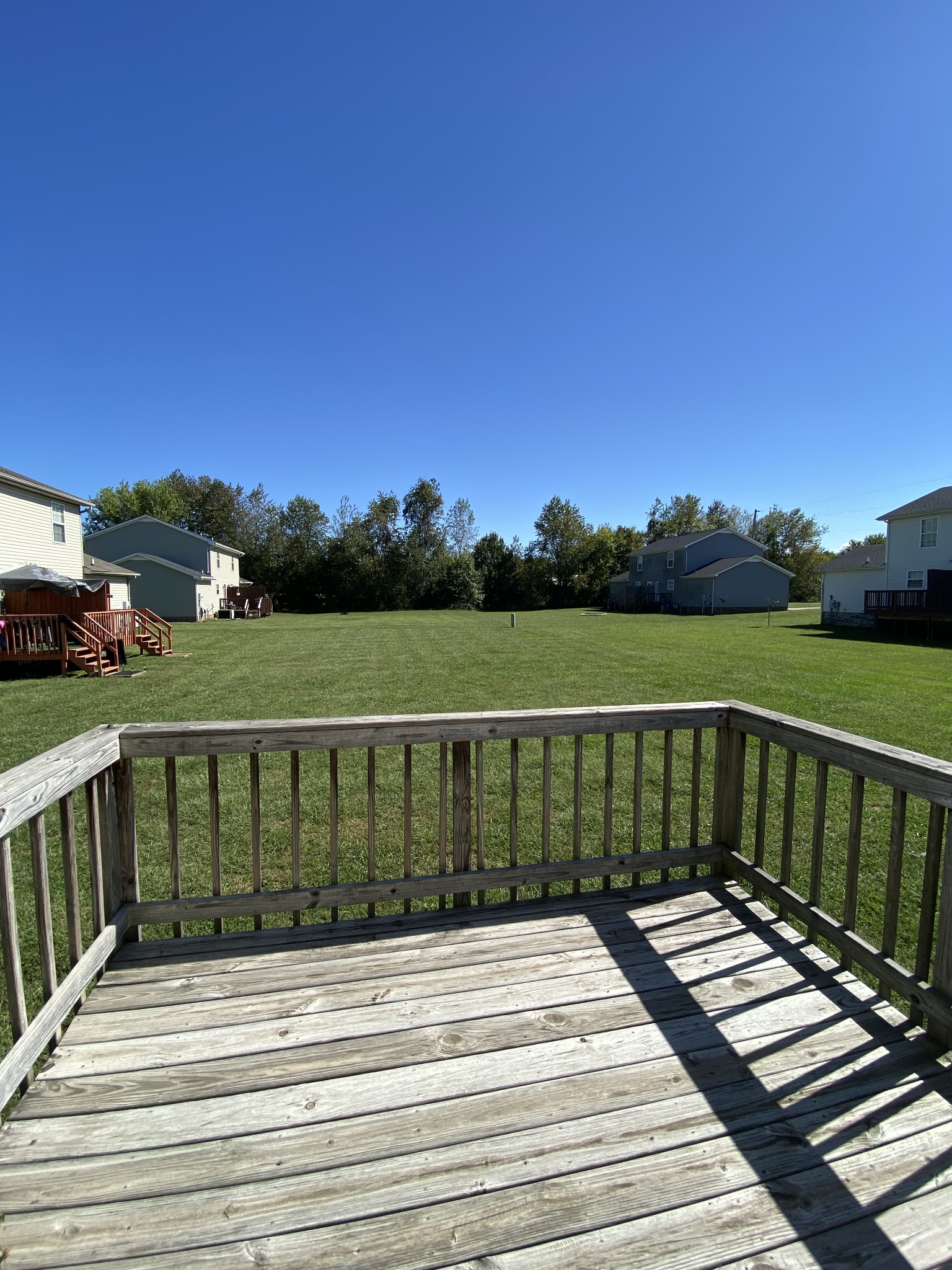 233 Tree Line Drive Oak Grove, KY 42262 - Photo 12 of 12 a view of balcony with wooden floor and fence