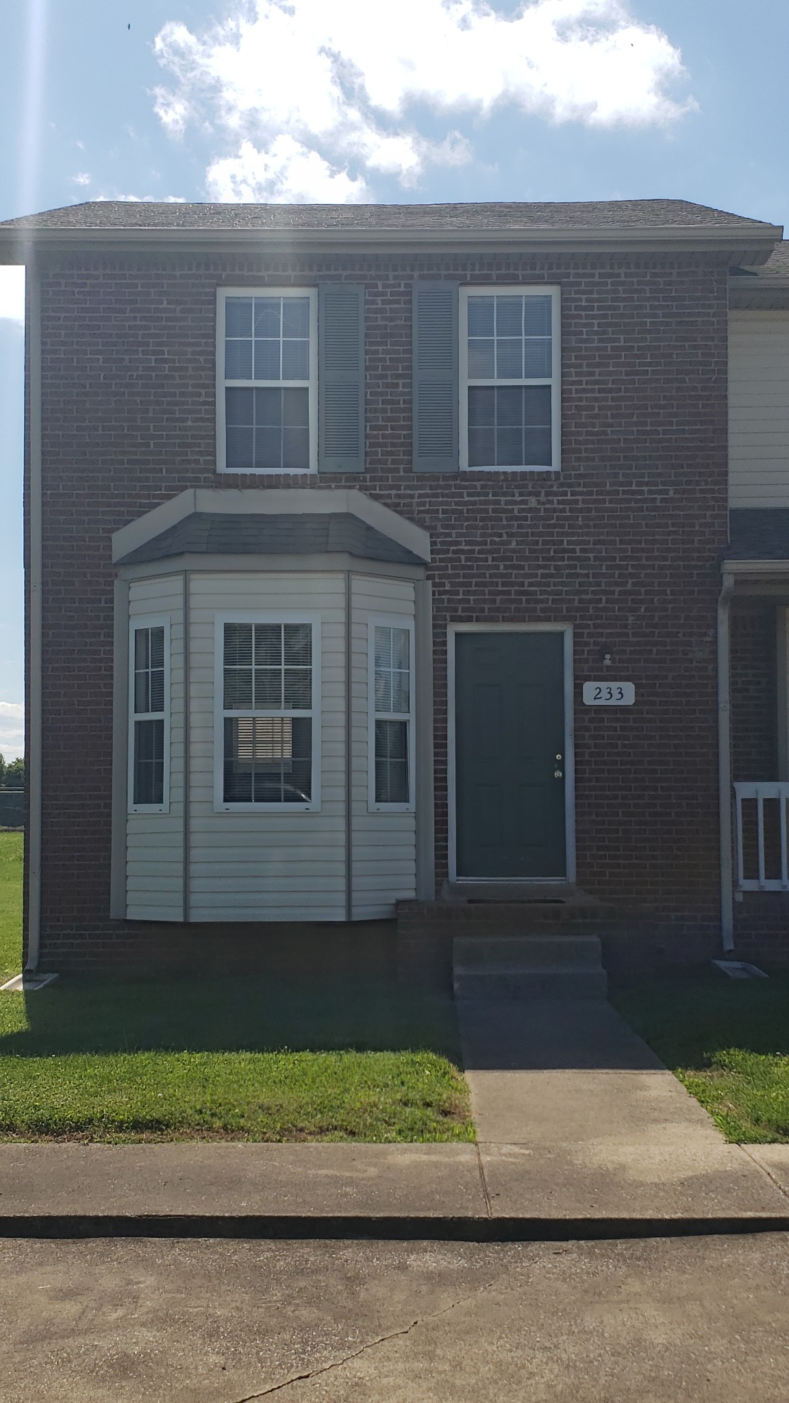 233 Tree Line Drive Oak Grove, KY 42262 - Photo 2 of 12 a front view of a house with a yard