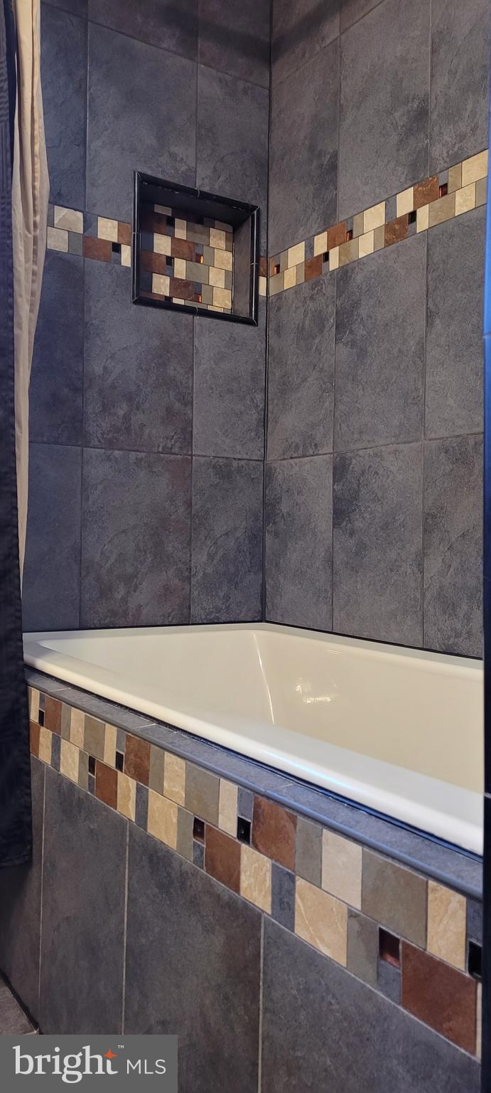 9 Estate Road Lumberton, NJ 08048 - Photo 14 of 21 Partial pic of bathroom tiling - so much more...