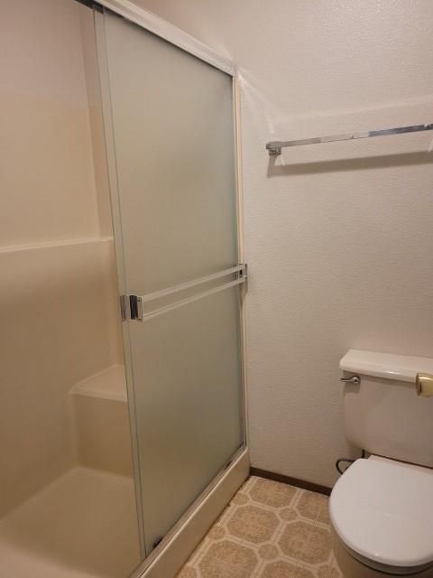 346 Gracie Road Nevada City, CA 95959 - Photo 43 of 66 a white toilet sitting next to a bath tub