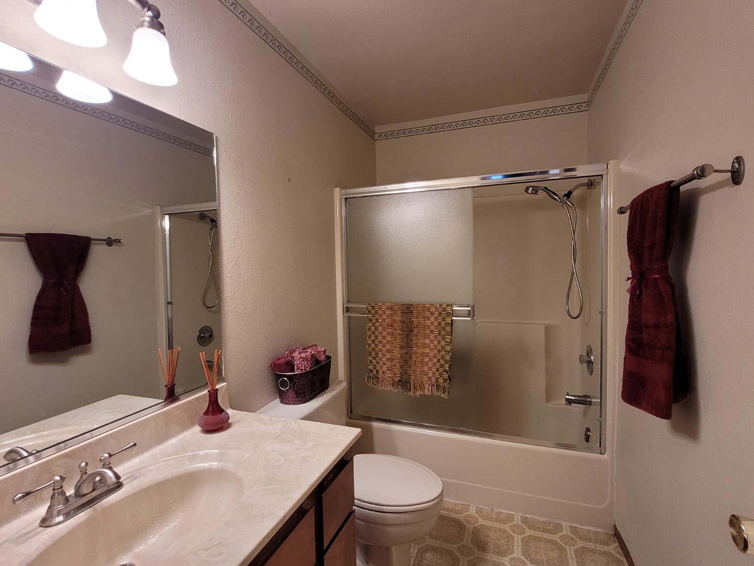 346 Gracie Road Nevada City, CA 95959 - Photo 47 of 66 a bathroom with a sink toilet and shower