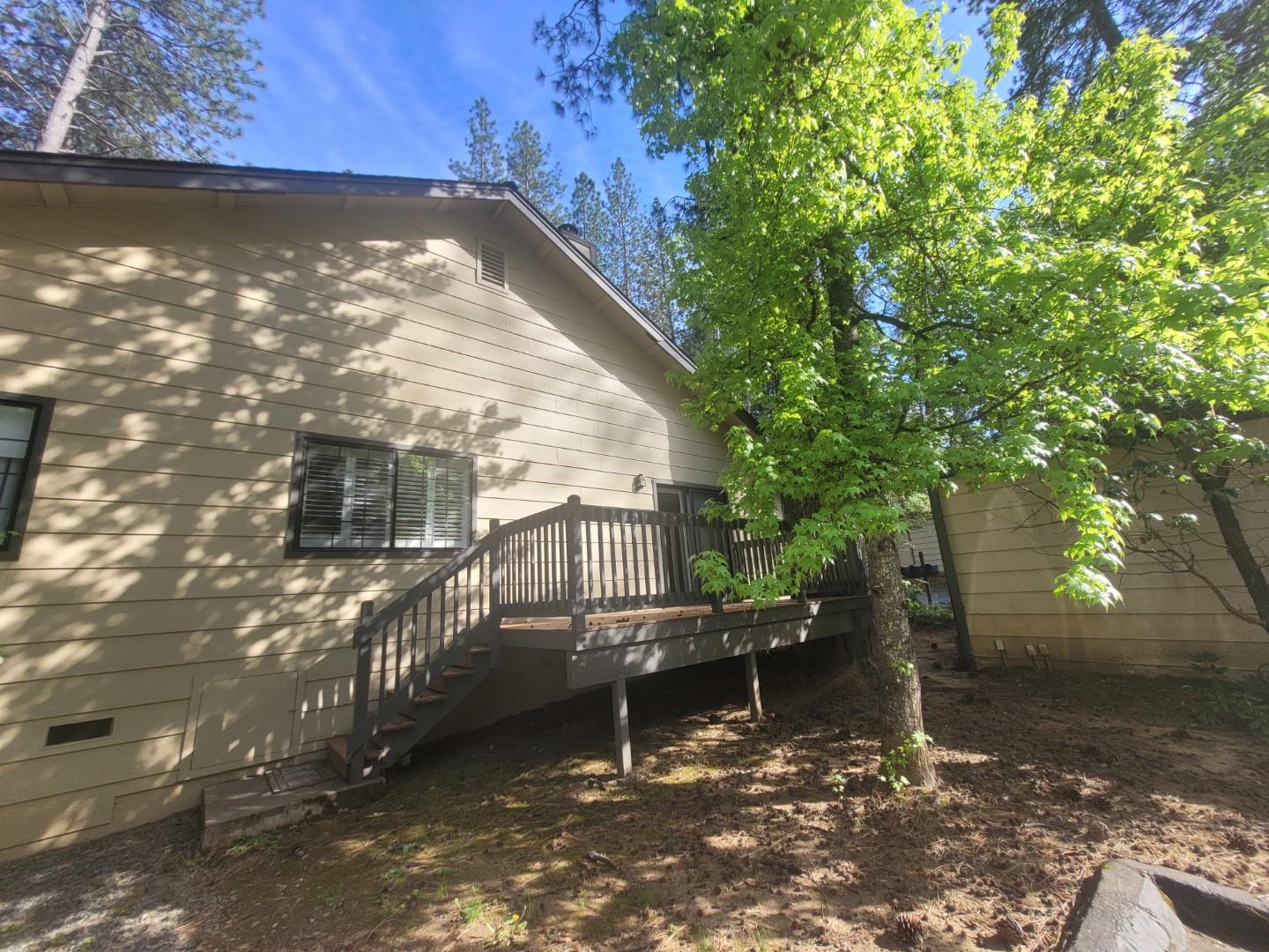 346 Gracie Road Nevada City, CA 95959 - Photo 51 of 66 a view of a wooden deck with a yard