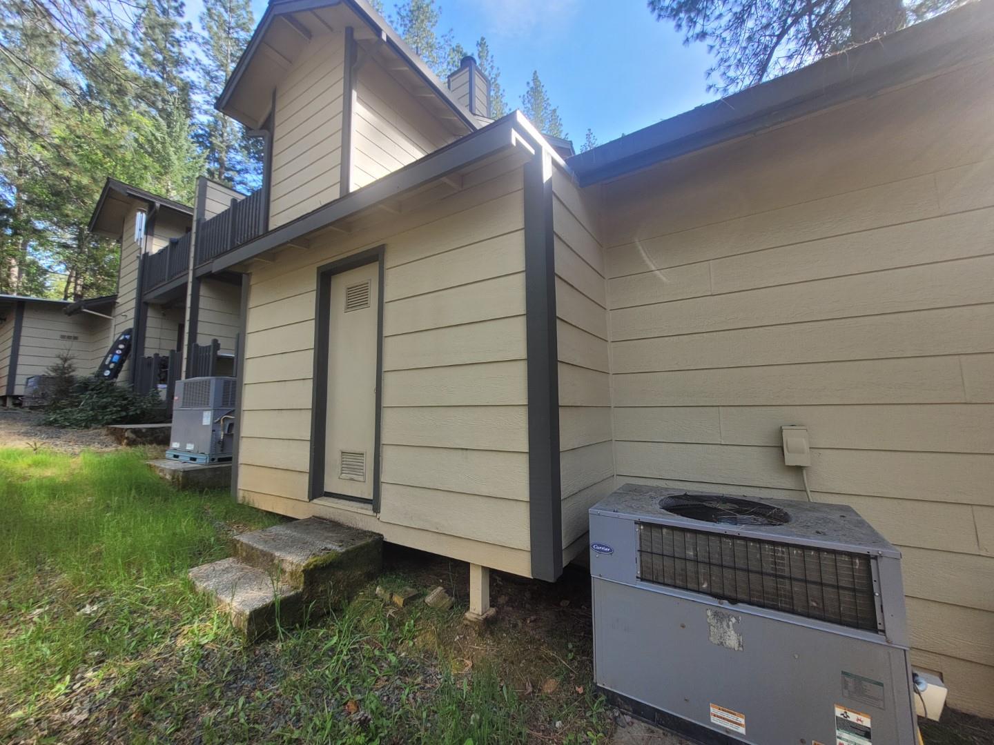 346 Gracie Road Nevada City, CA 95959 - Photo 52 of 66 a view of a house with a yard