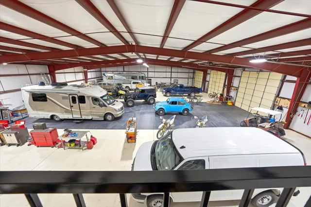 a bathroom with a sink toilet and a mirror