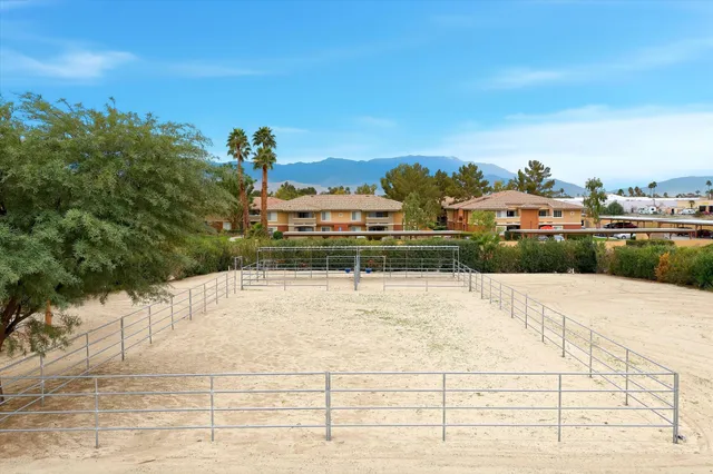 an aerial view of a house with lake view