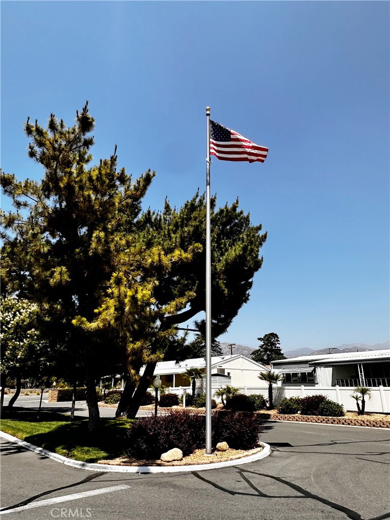 2140 Mentone Boulevard, Unit 97 Mentone, CA 92359 - Photo 20 of 29 a picture of street with view of tree