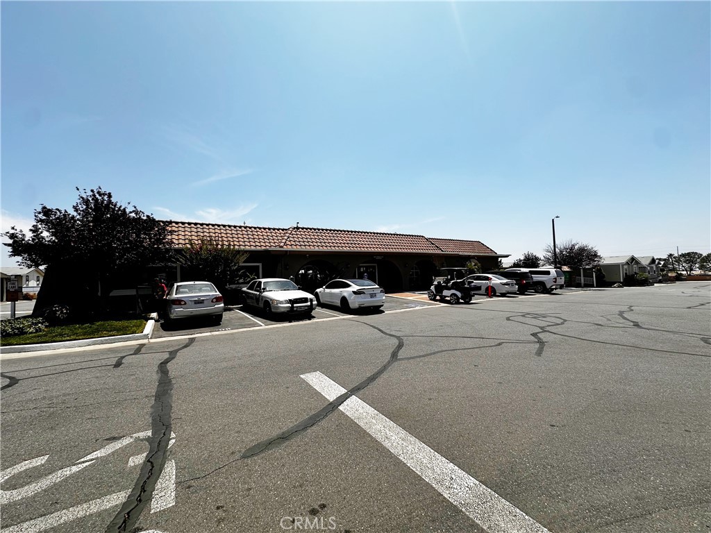 2140 Mentone Boulevard, Unit 97 Mentone, CA 92359 - Photo 24 of 29 a view of parking space and parking