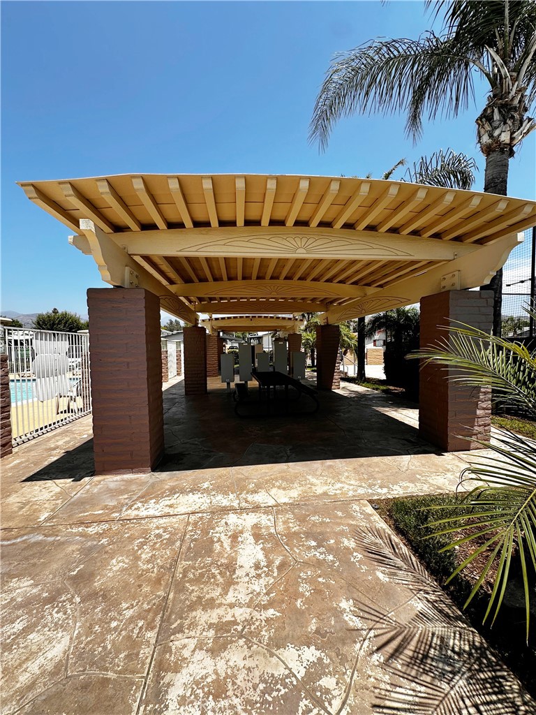 2140 Mentone Boulevard, Unit 97 Mentone, CA 92359 - Photo 25 of 29 a view of a backyard of a house
