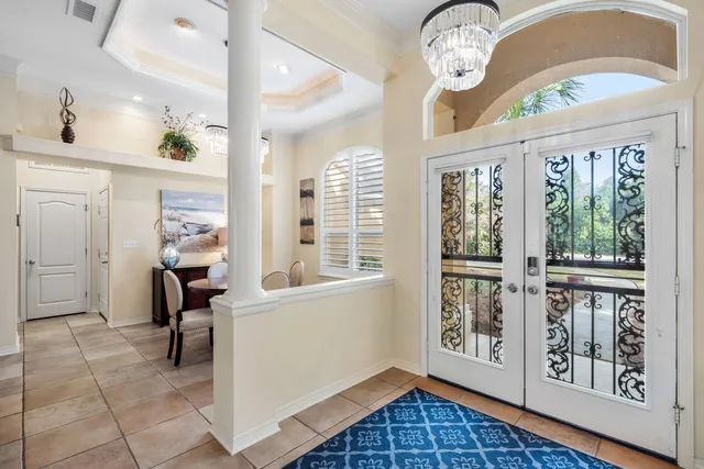 a view of a dining room with furniture and window