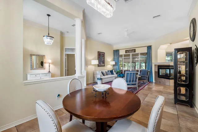 a spacious bathroom with a sink a toilet and a large mirror