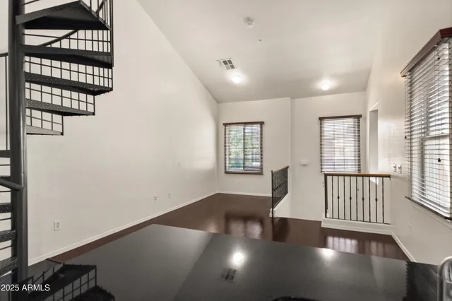 an empty room with windows