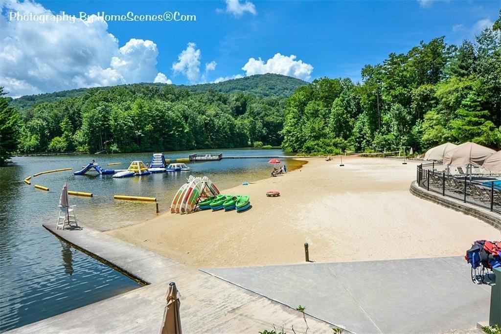 115 Chestnut Oak Point Big Canoe, GA 30143 - Photo 50 of 56 a view of a swimming pool with a patio