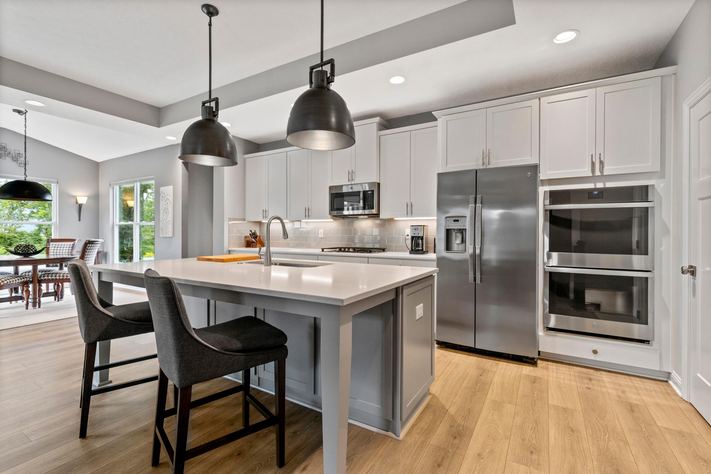3604 Whispering Pines Road Delaware, OH 43015 - Photo 28 of 58 Chef's Kitchen with large quartz Island with room for your barstools.