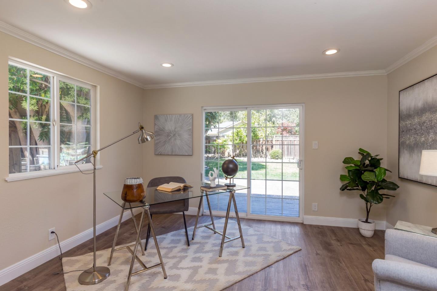 552 Marsh Road Menlo Park, CA 94025 - Photo 11 of 22 a living room with furniture and a potted plant