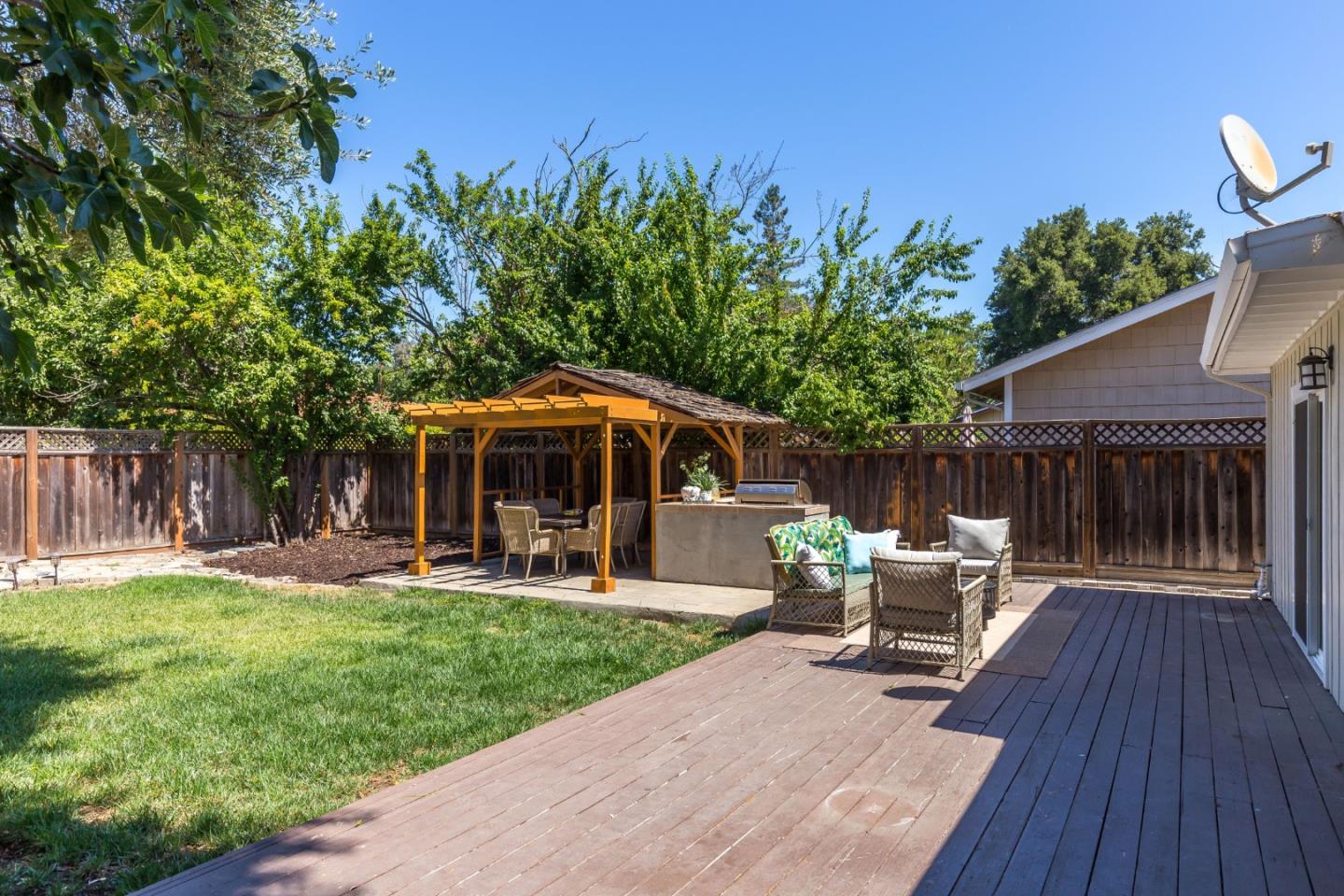 552 Marsh Road Menlo Park, CA 94025 - Photo 22 of 22 a view of a house with backyard and sitting area