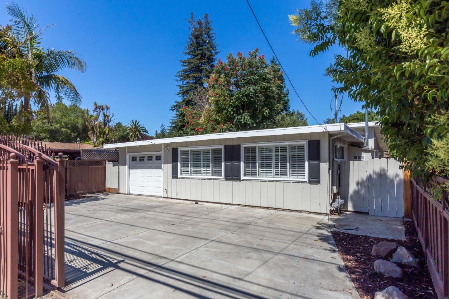 552 Marsh Road Menlo Park, CA 94025 - Photo 3 of 22 a house view with a backyard space