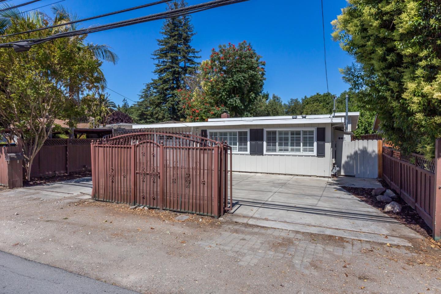 552 Marsh Road Menlo Park, CA 94025 - Photo 4 of 22 a view of a house with a backyard