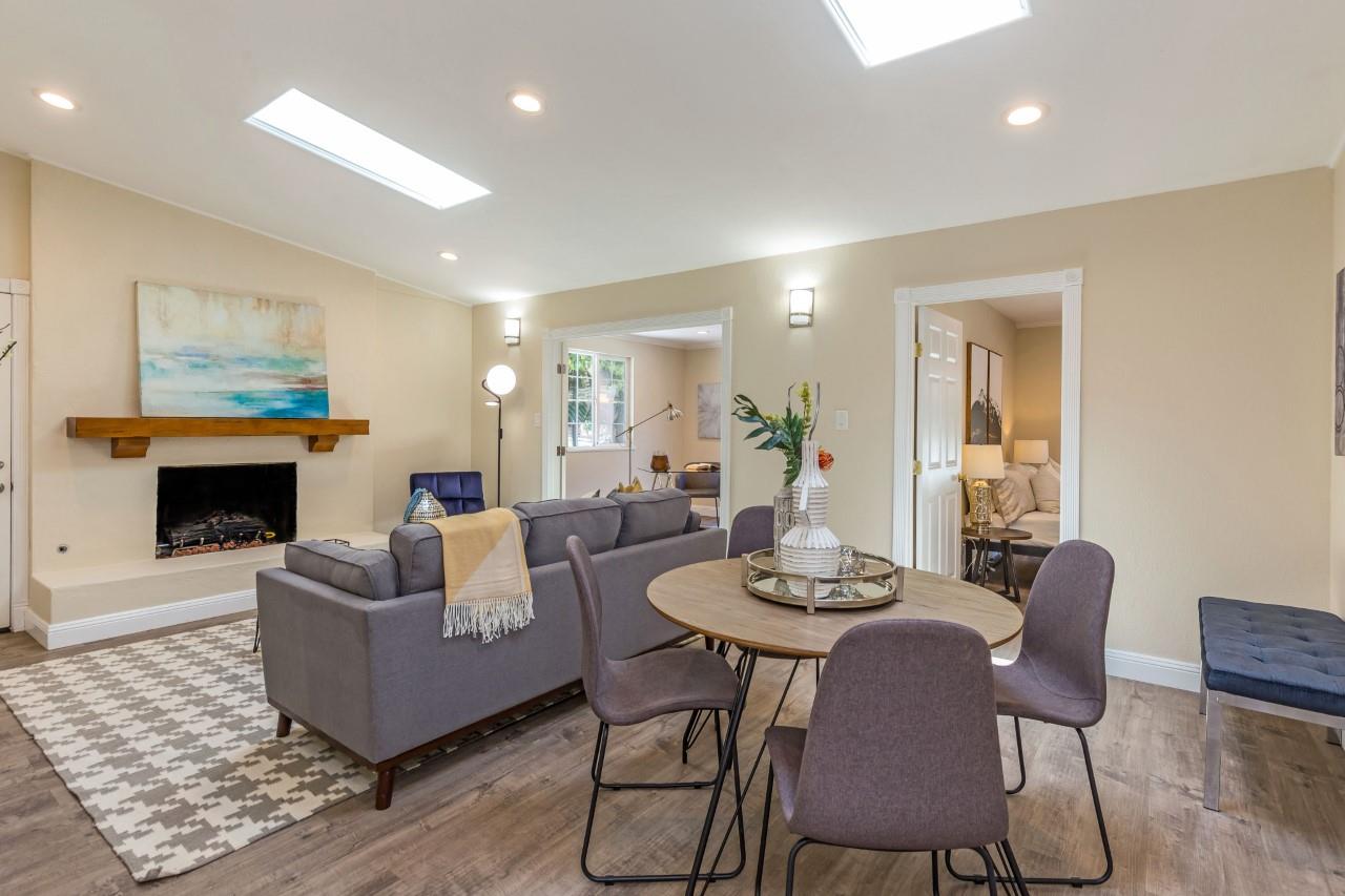 552 Marsh Road Menlo Park, CA 94025 - Photo 6 of 22 a living room with fireplace furniture and a fireplace