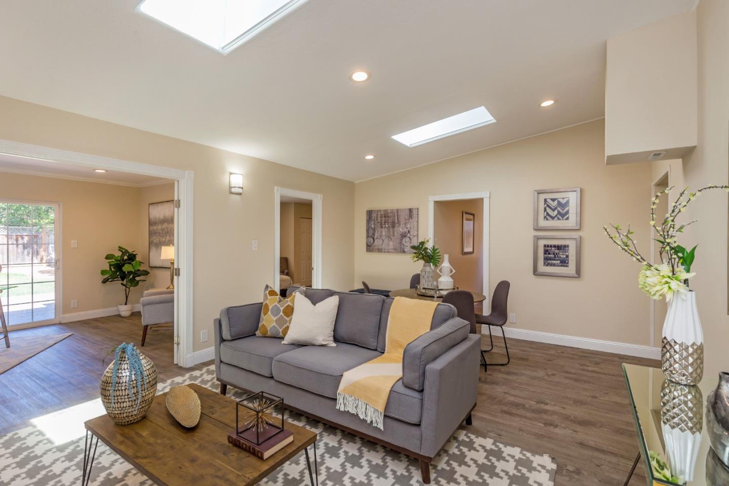 552 Marsh Road Menlo Park, CA 94025 - Photo 7 of 22 a living room with furniture and wooden floor