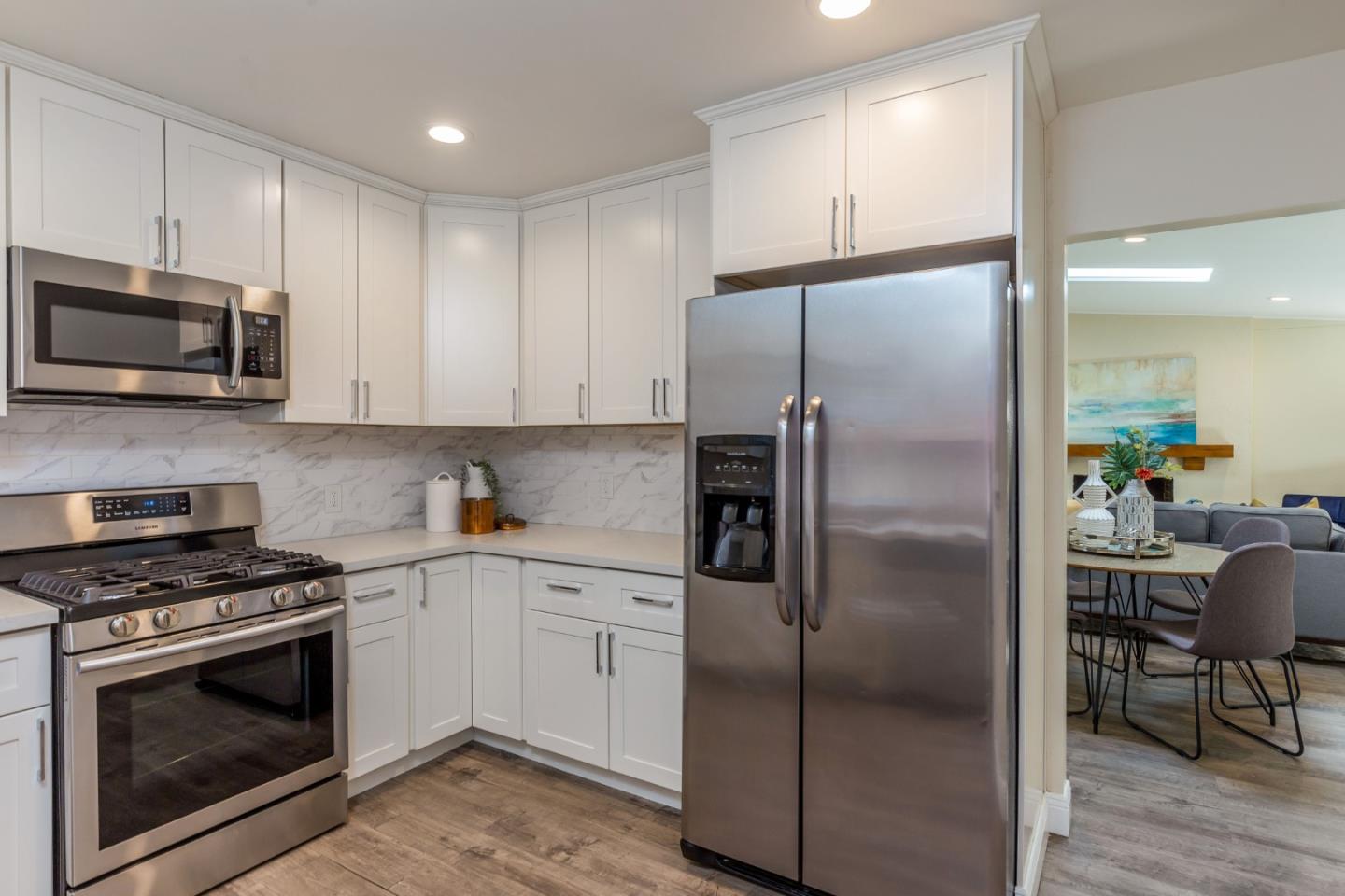 552 Marsh Road Menlo Park, CA 94025 - Photo 10 of 22 a kitchen with a refrigerator stove and microwave