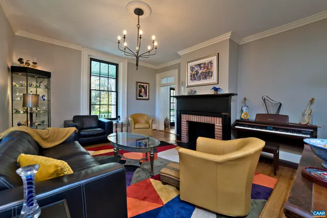 a bathroom with a sink toilet a mirror and shower