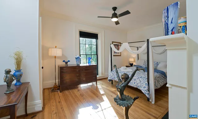 an aerial view of a house with yard swimming pool and outdoor seating