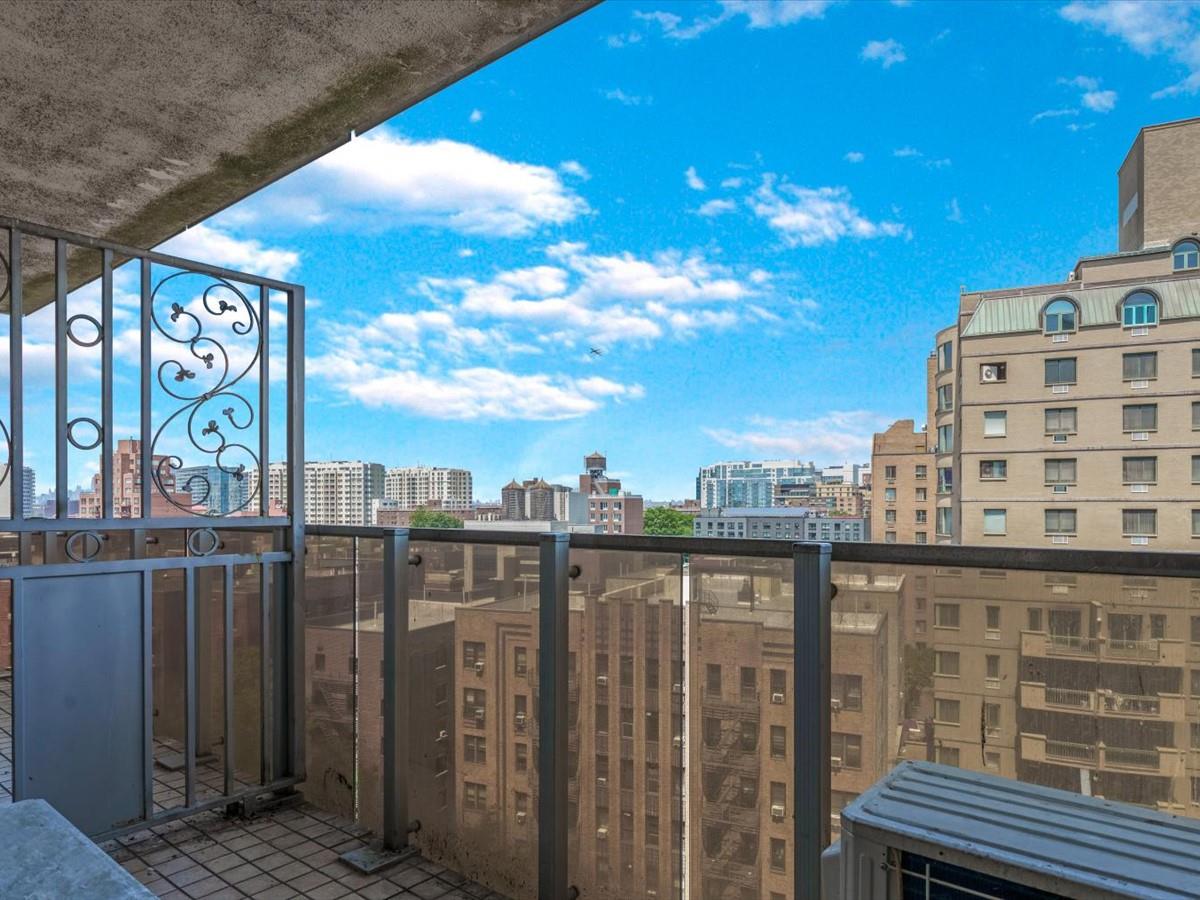 133-38 Sanford Avenue, Unit 11C Queens, NY 11355 - Photo 21 of 24 a view of a balcony with city view