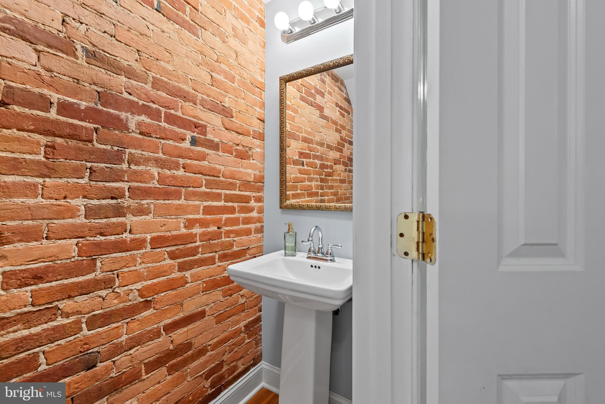 827 Light Street Baltimore, MD 21230 - Photo 8 of 38 Half bath on main level