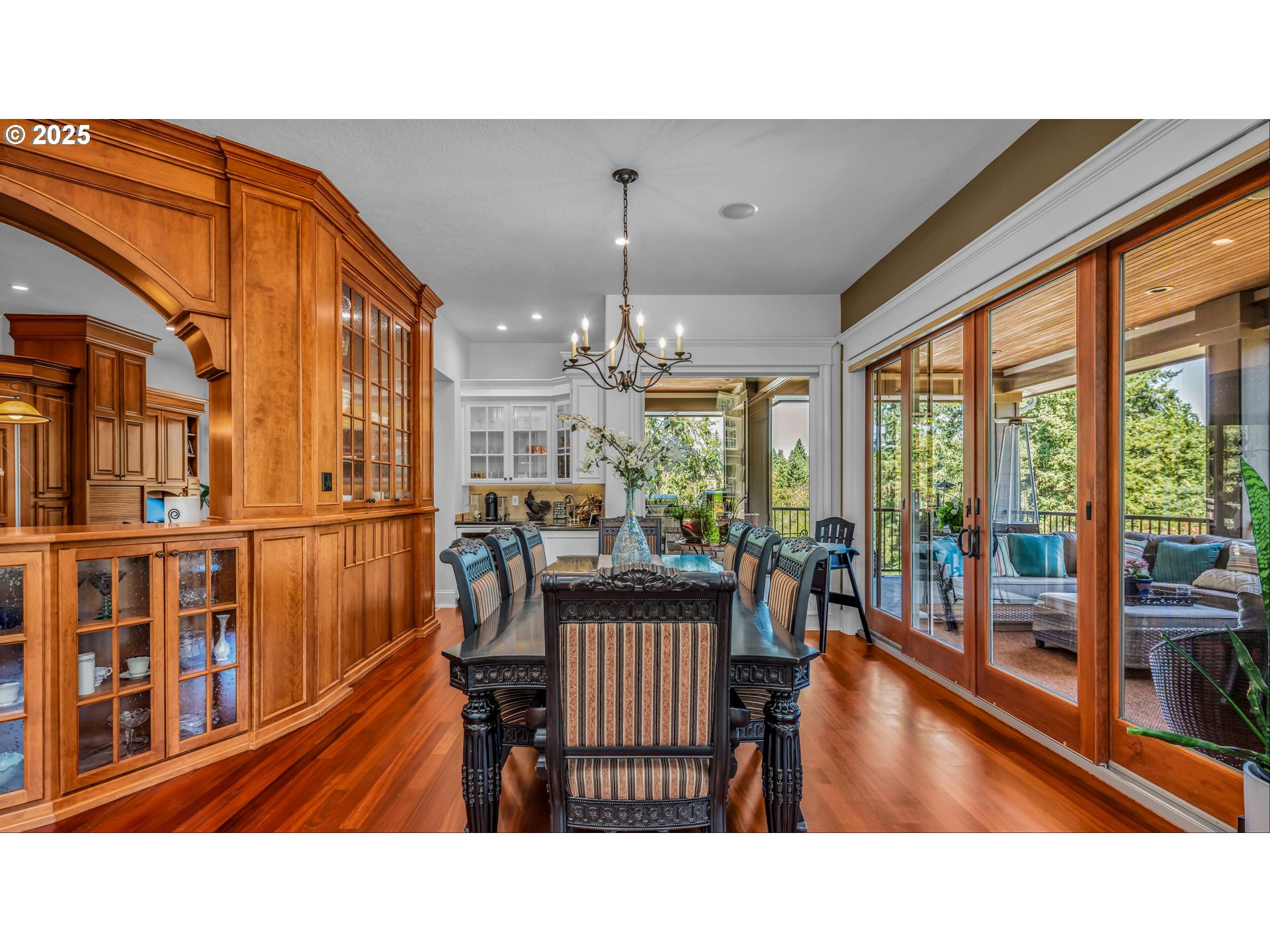 4075 Northwest Camala Drive Albany, OR 97321 - Photo 16 of 48 a dining room with furniture large windows and a chandelier