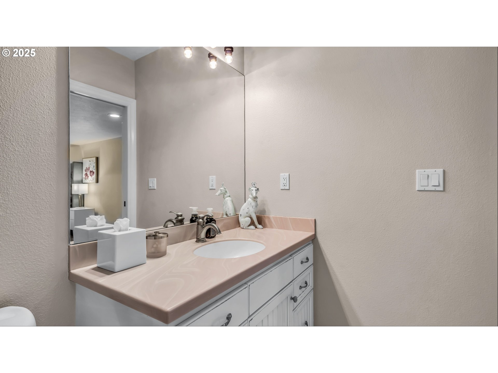 4075 Northwest Camala Drive Albany, OR 97321 - Photo 37 of 48 a bathroom with a sink vanity mirror and toilet