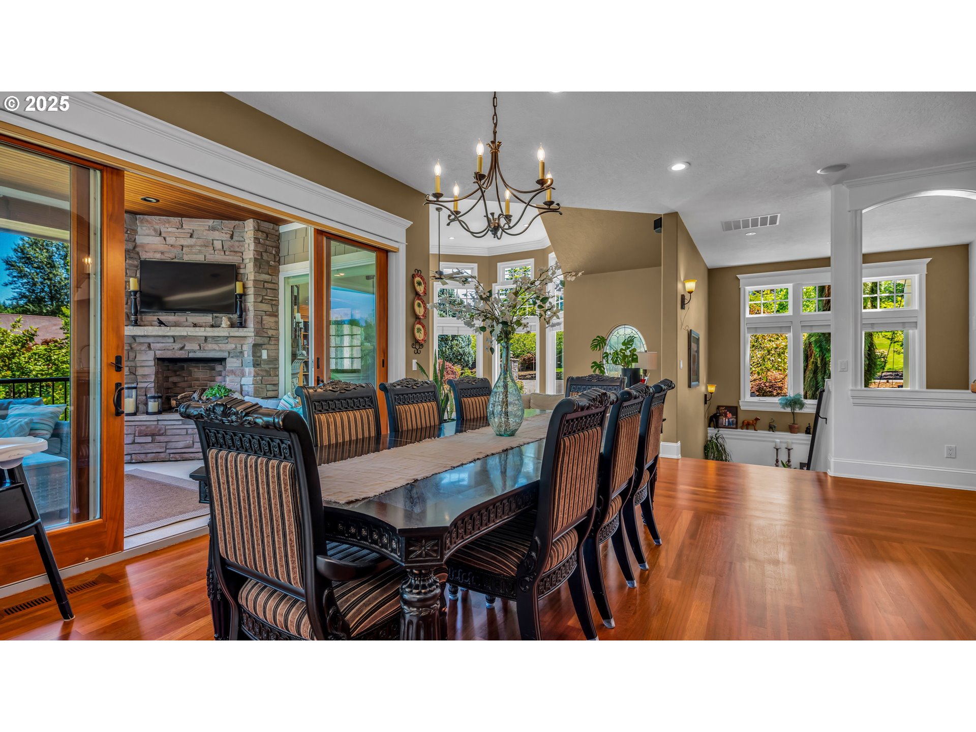 4075 Northwest Camala Drive Albany, OR 97321 - Photo 9 of 48 a living room with furniture dining table and a chandelier