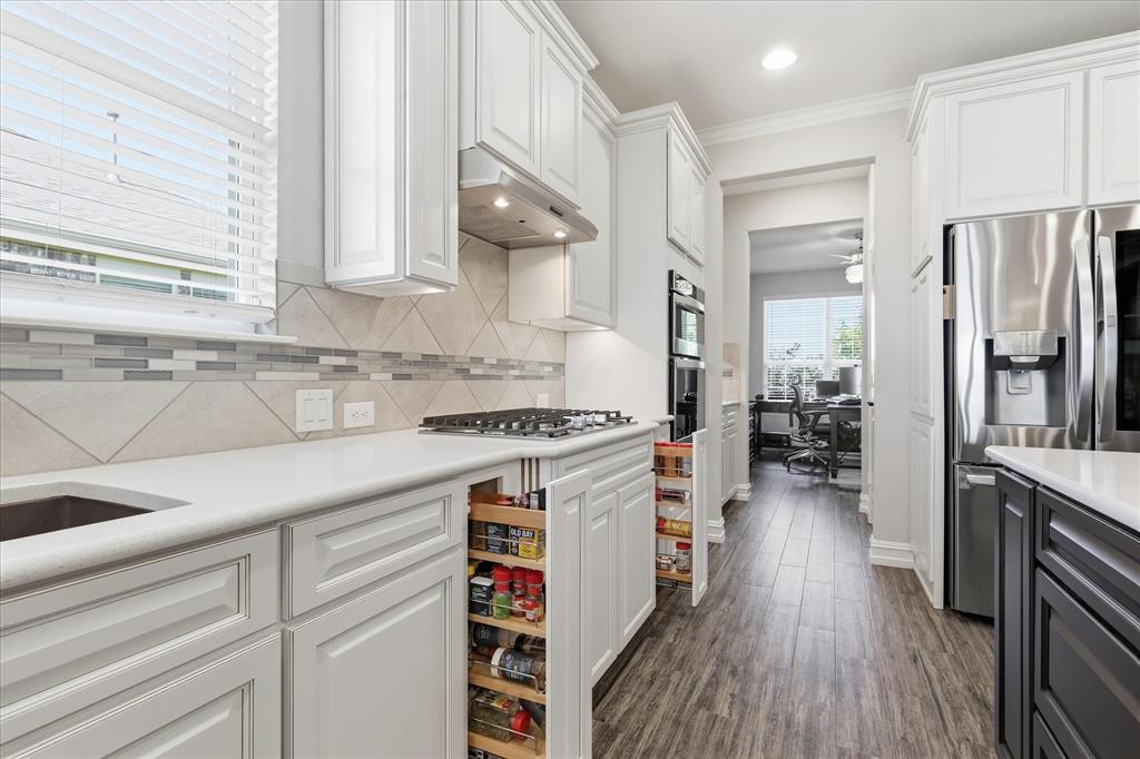 8870 Silent River Road Frisco, TX 75036 - Photo 11 of 40 Pull out spice racks