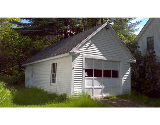 40 Flaggy Meadow Road Buxton, ME 04093 - Photo 2 of 32 Exterior Front. Oversized garage is...