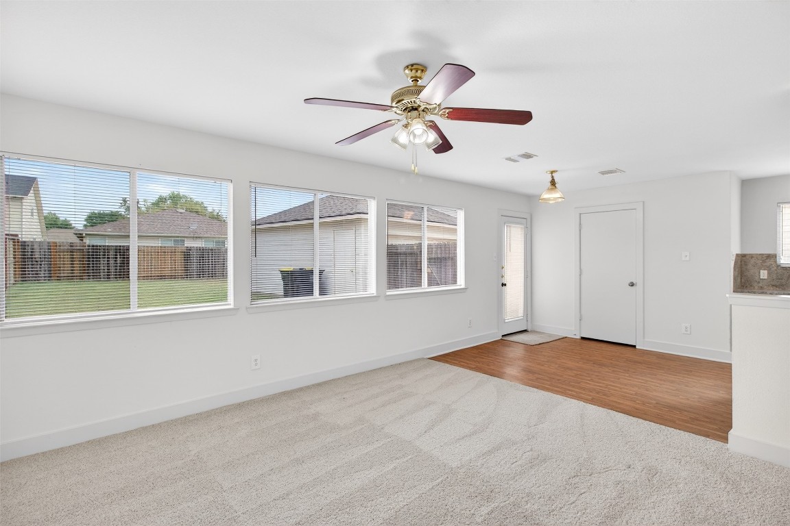 803 Dragonfly Drive Conroe, TX 77301 - Photo 14 of 50 a view of an empty room with a window