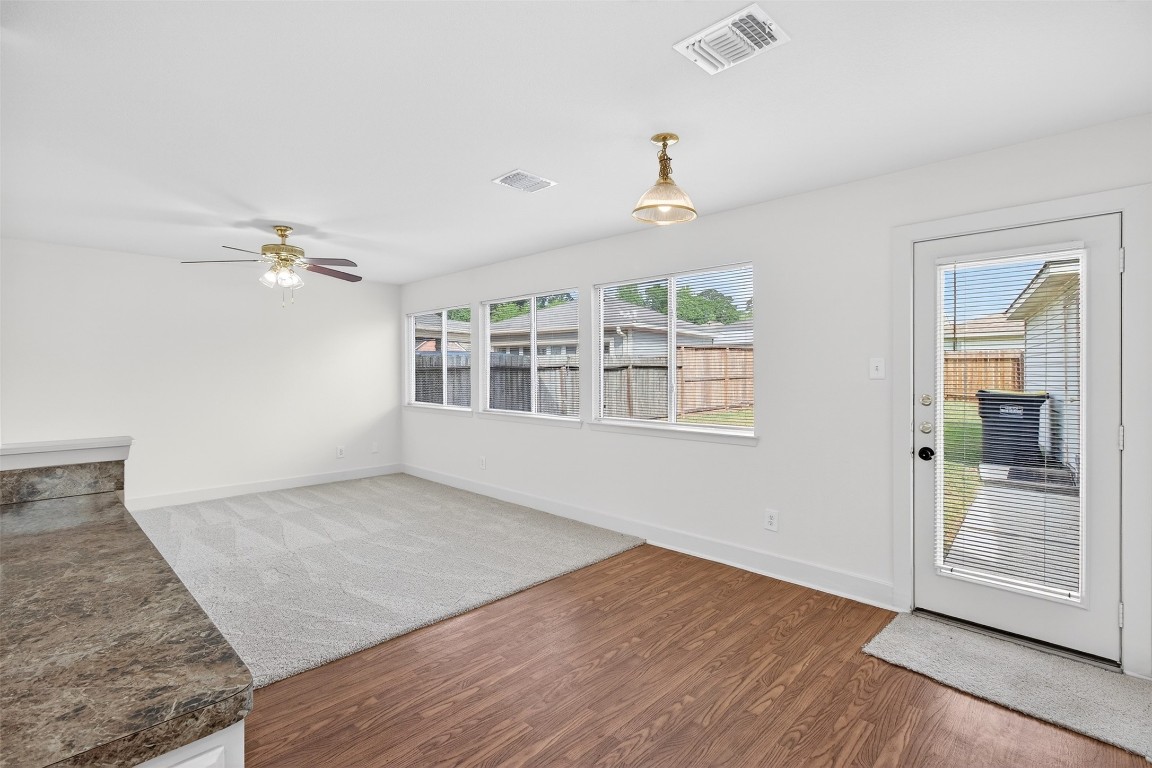 803 Dragonfly Drive Conroe, TX 77301 - Photo 20 of 50 wooden floor in an empty room with a window