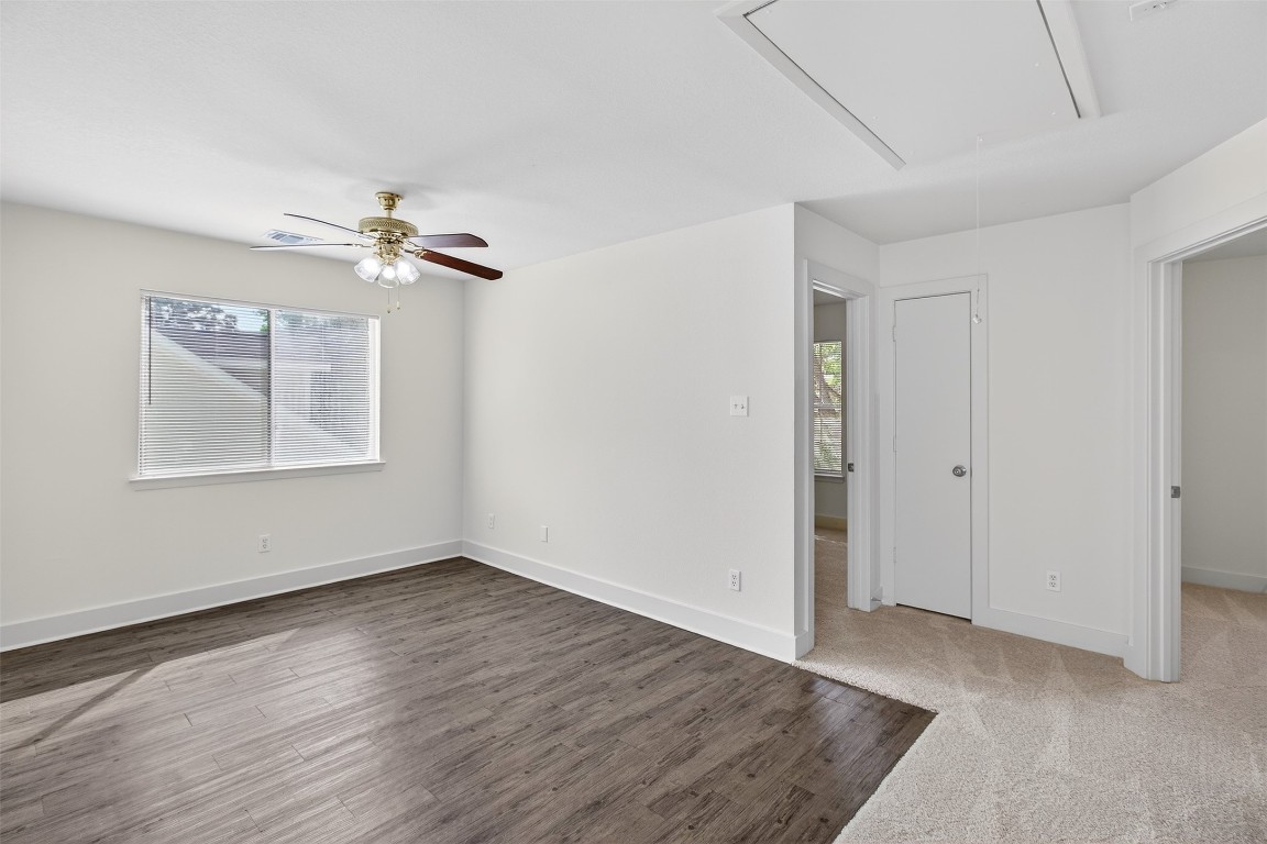 803 Dragonfly Drive Conroe, TX 77301 - Photo 27 of 50 wooden floor in an empty room with a window