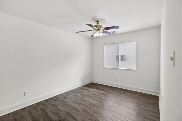 a view of a hallway with closet