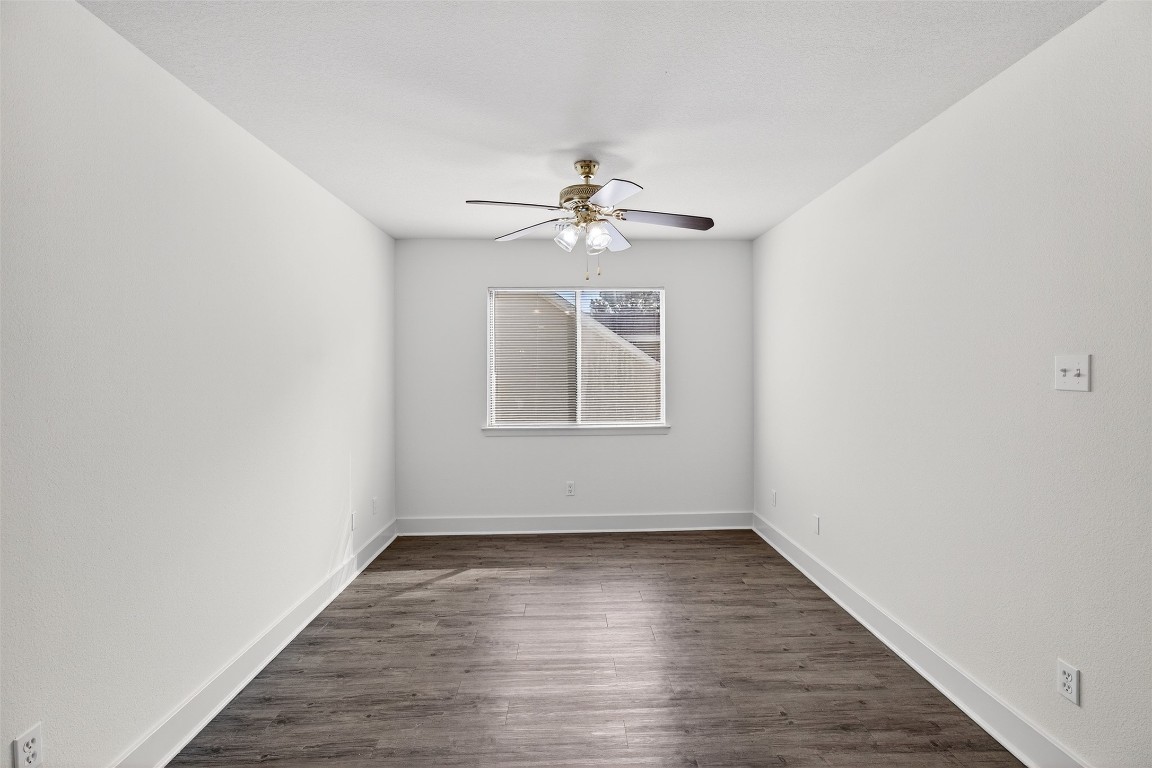 803 Dragonfly Drive Conroe, TX 77301 - Photo 31 of 50 wooden floor in an empty room with a window