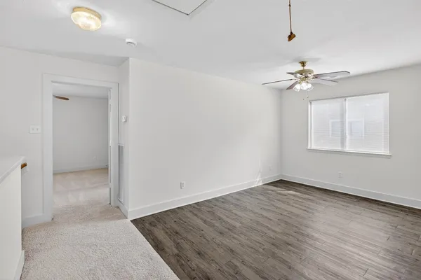 an empty room with windows