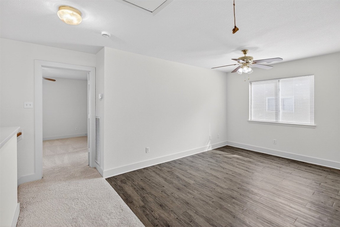 803 Dragonfly Drive Conroe, TX 77301 - Photo 35 of 50 wooden floor in an empty room with a window