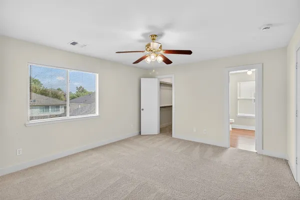 a view of a chandelier fan in a room