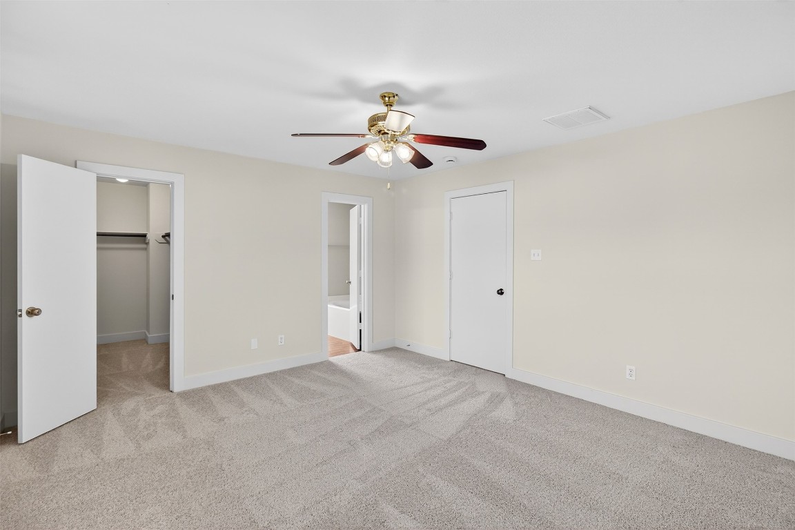 803 Dragonfly Drive Conroe, TX 77301 - Photo 40 of 50 a view of a chandelier fan in a room